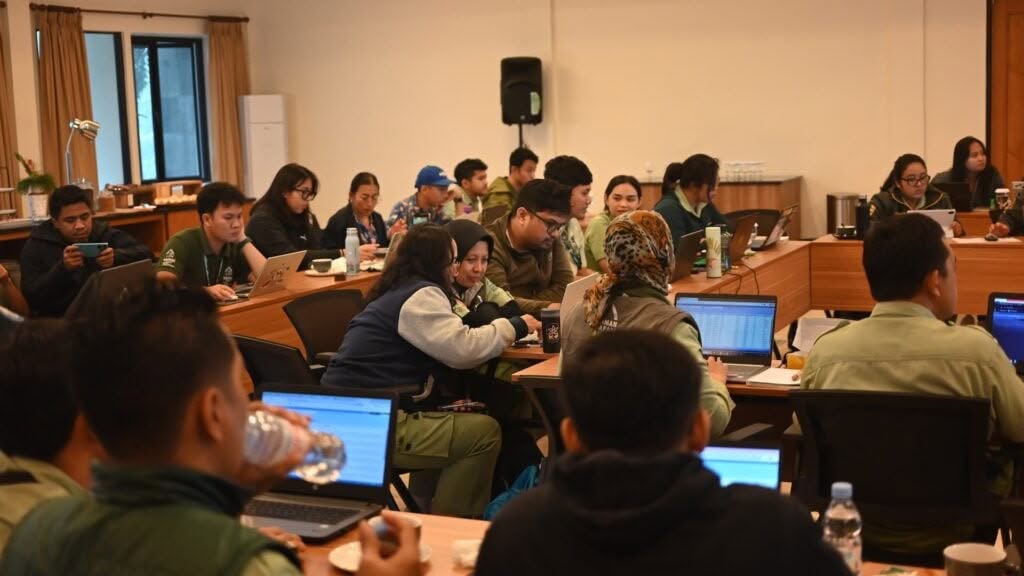 Image of people taking part in ZIMS training
